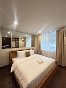 Postel nebo postele na pokoji v ubytování Makati Medical City Accommodation