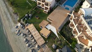 an overhead view of a building next to the beach at Olympion Sunset Halkidiki in Fourka