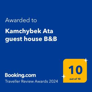 a yellow sign with the text awarded to karmelbeck africa guest house at "Kamchybek Ata" guest house B&B in Tërt-Kul'