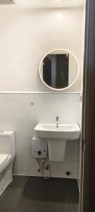 Ein Badezimmer in der Unterkunft Voss Condominium