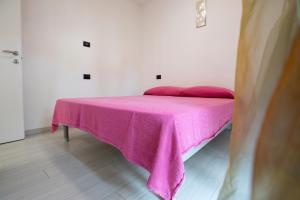 Postel nebo postele na pokoji v ubytování Villa Mimosa