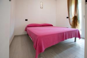 Postel nebo postele na pokoji v ubytování Villa Mimosa