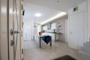 Kuchyň nebo kuchyňský kout v ubytování Villa Mimosa
