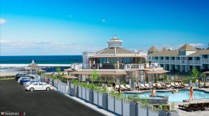 a view of a resort with a pool and a building at Anchorage by the Sea in Ogunquit