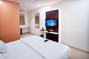 TV a/nebo společenská místnost v ubytování Hotel Haldi