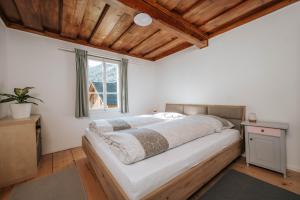 Postel nebo postele na pokoji v ubytování Ferienhaus s Manz
