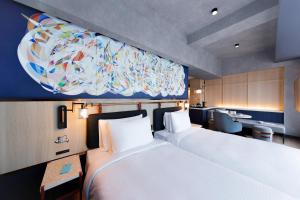 Caption by Hyatt Namba Osaka客房内的一张或多张床位