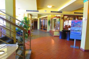 a hallway of a store with a staircase and a lobby at Chata u vinára Milana, Tatralandia in Liptovský Mikuláš +47 photos