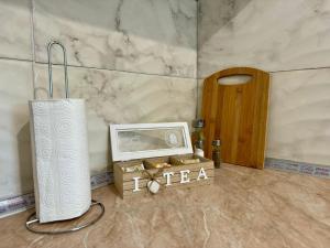 a room with a clock and a box with a box at Luxury Studios in Central Kyrenia in Kérynia +58 photos