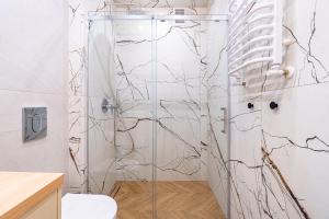 Koupelna v ubytování Apartament Radosny, Klimatyzacja, PW INVEST HOME + 21 fotografií