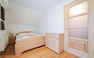 Posteľ alebo postele v izbe v ubytovaní Wonder Home - Apartamenty z balkonami blisko centrum Karpacza