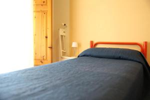 Posteľ alebo postele v izbe v ubytovaní B&B Casita GioJa