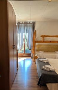 Katil atau katil-katil dalam bilik di Albergo Varone