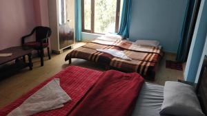 Ένα ή περισσότερα κρεβάτια σε δωμάτιο στο The Whyt Deluxe Homestay +28 φωτογραφίες