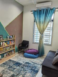a bedroom with a bean bag bed and a window at Bandar Melaka Family Bungalow Private Pool BBQ WiFi Netflix in Melaka