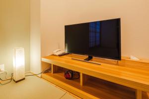 TV a/nebo společenská místnost v ubytování Miro Hotel Momodanikoen-mae
