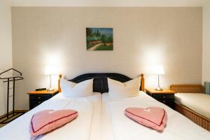 Postel nebo postele na pokoji v ubytování Haus Sonnenwinkel - SommerBergBahn unlimited kostenlos