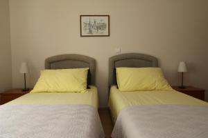Posteľ alebo postele v izbe v ubytovaní Apartments Salona