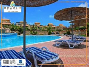 Πισίνα στο ή κοντά στο Twin house Marseilia beach 3 north coast with golf car