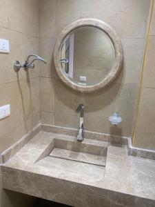 Ένα μπάνιο στο Twin house Marseilia beach 3 north coast with golf car