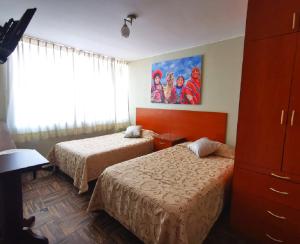 Postel nebo postele na pokoji v ubytování Bon Repos Arequipa