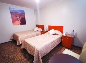 Postel nebo postele na pokoji v ubytování Bon Repos Arequipa