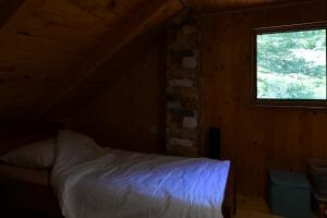 Postel nebo postele na pokoji v ubytování Stara trešnja