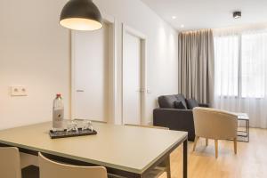 Mon Suites Jardín de Ayora的休息区