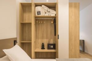 Mon Suites Jardín de Ayora客房内的一张或多张床位