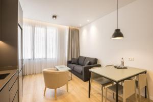 Mon Suites Jardín de Ayora的休息区