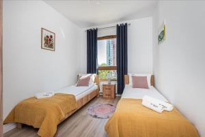 Posteľ alebo postele v izbe v ubytovaní Nova Letnica 2 - BillBerry Apartments + 14 fotografií