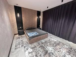 Postel nebo postele na pokoji v ubytování Вилла + 28 fotografií