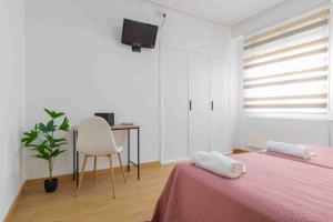 Postel nebo postele na pokoji v ubytování CINCO VILLAS