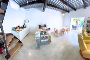 a large room with a kitchen and a dining room at Grand Loft Lumineux - Gare St Charles 10 MIN in Marseille