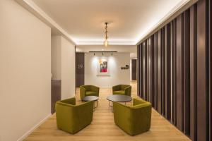 Mon Suites Jardín de Ayora的休息区