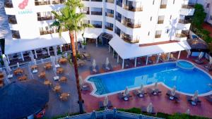 an overhead view of a hotel with a swimming pool at Hawaii Hotel in Marmaris