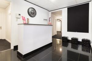 Kuchyň nebo kuchyňský kout v ubytování Gran Via 63 Rooms