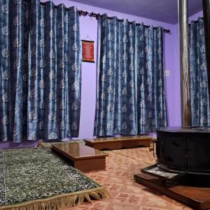 Posezení v ubytování Shiva Homestay