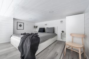 Postel nebo postele na pokoji v ubytování Waterfront Cabins