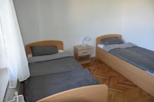 Postel nebo postele na pokoji v ubytování Apartma podeželje