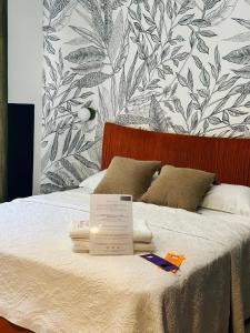 Postel nebo postele na pokoji v ubytování Mandarin Apulia 19 B&B