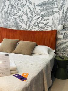 Postel nebo postele na pokoji v ubytování Mandarin Apulia 19 B&B