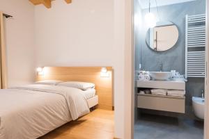 Postel nebo postele na pokoji v ubytování Agriturismo Grion