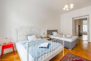 Postel nebo postele na pokoji v ubytování Apartments Vezenska