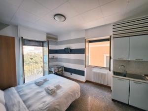 A bed or beds in a room at Residence Corallo