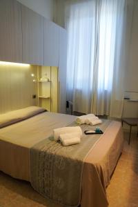 Postel nebo postele na pokoji v ubytování Hotel Cilene