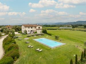 an estate with a swimming pool and a house at Cantagrillo Boutique Resort in Vinci