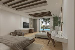 1 dormitorio con cama, escritorio y lavamanos en Acapulco Resort Hotel en Kyrenia