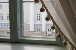 an open window with a view of a building at Antonius Hotel in Tartu