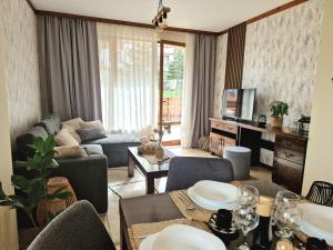 O zonă de relaxare la Cozy apartment in luxury SPA resort St Ivan Rilski Bansko -free wellness & parking- +32 fotografii